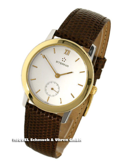 Eterna winding by hand in steel and gold